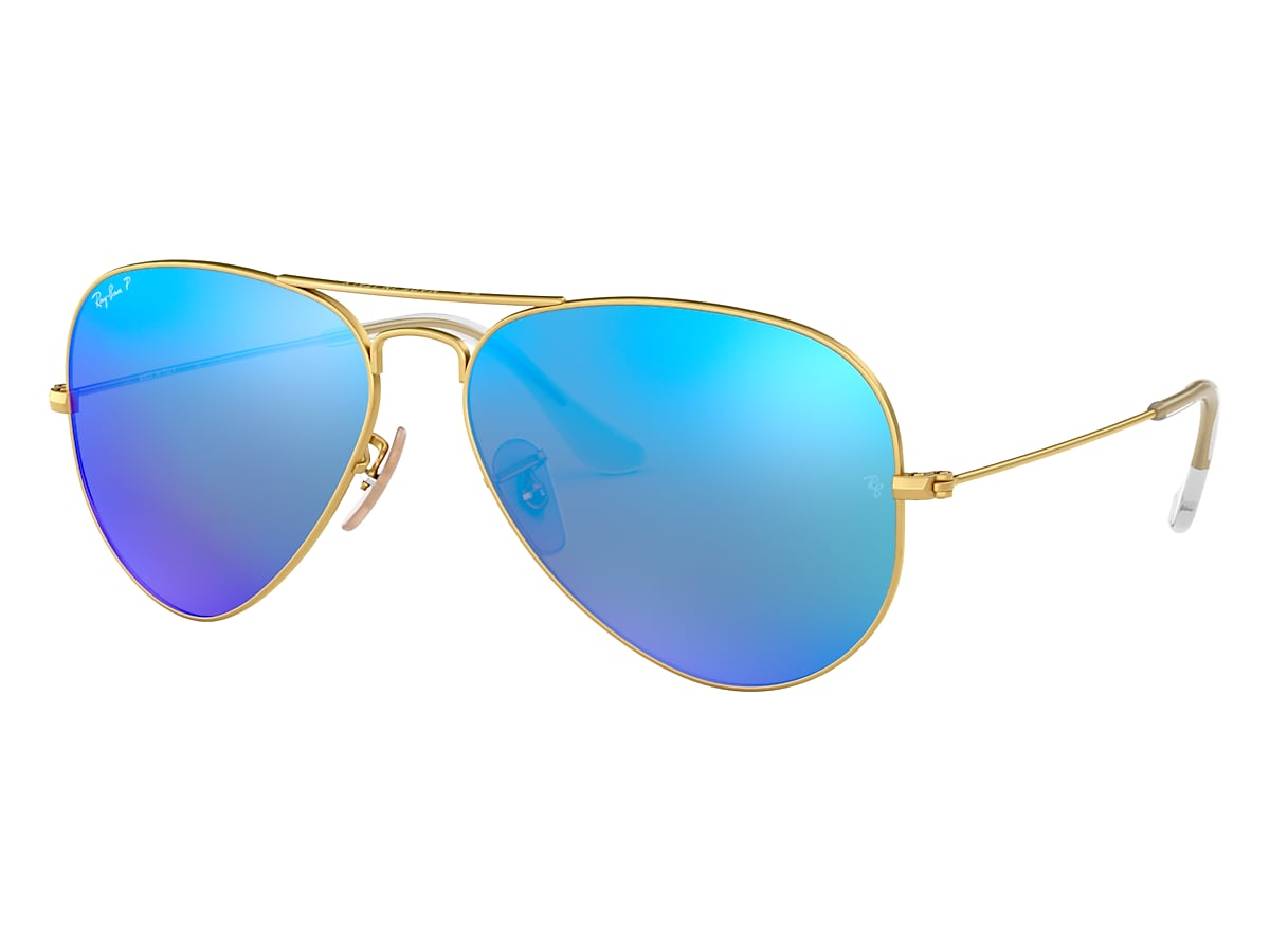 montar Parque jurásico Normal Gafas de Sol Aviator Flash Lenses en Oro y Azul | Ray-Ban®