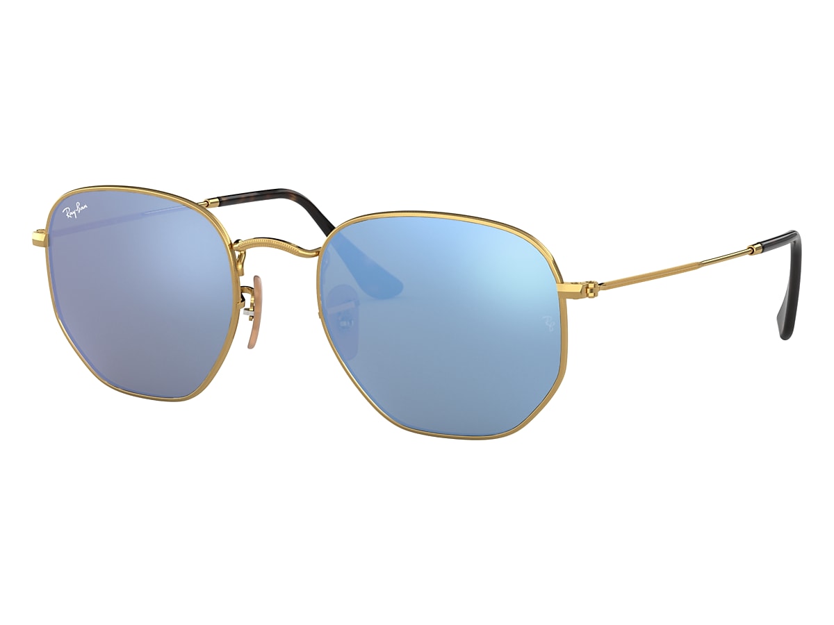 harina Estrecho de Bering Perseguir Gafas de Sol Hexagonal Flat Lenses en Oro y Azul Claro | Ray-Ban® harina Estrecho de Bering Perseguir Gafas de Sol Hexagonal Flat Lenses en Oro y Azul Claro | Ray-Ban®