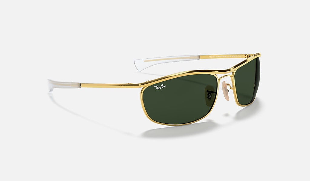 Becks Reflectie Dominant Olympian I Deluxe Sunglasses in Gold and Green | Ray-Ban®