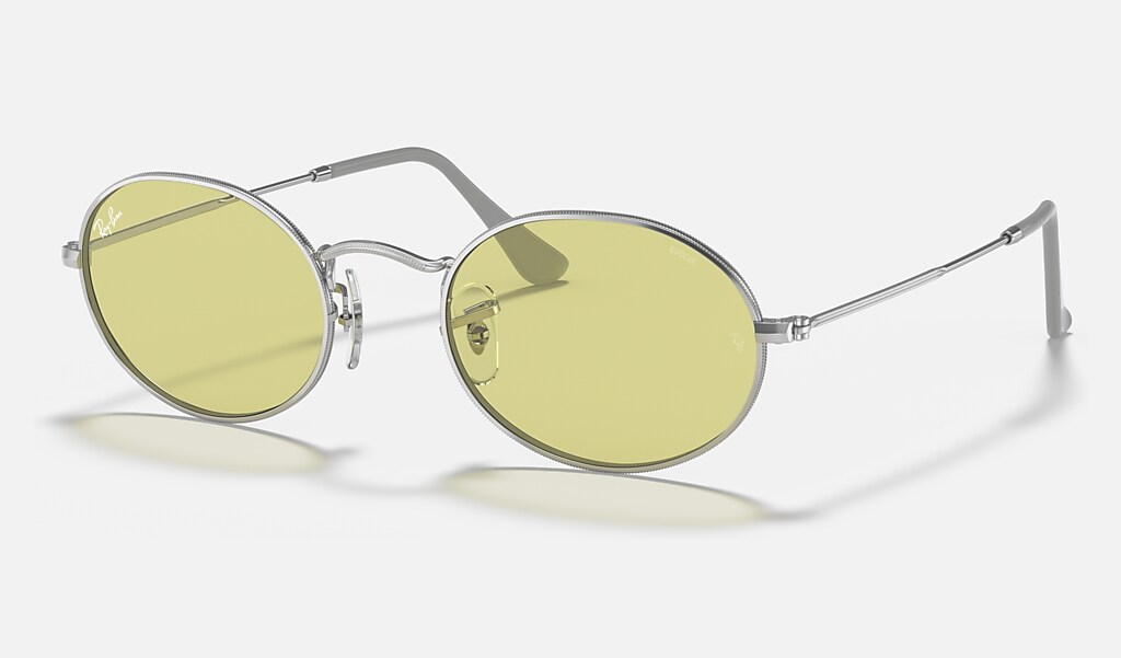 Oval Solid Evolve Sunglasses in Silver and Yellow/Red Photochromic