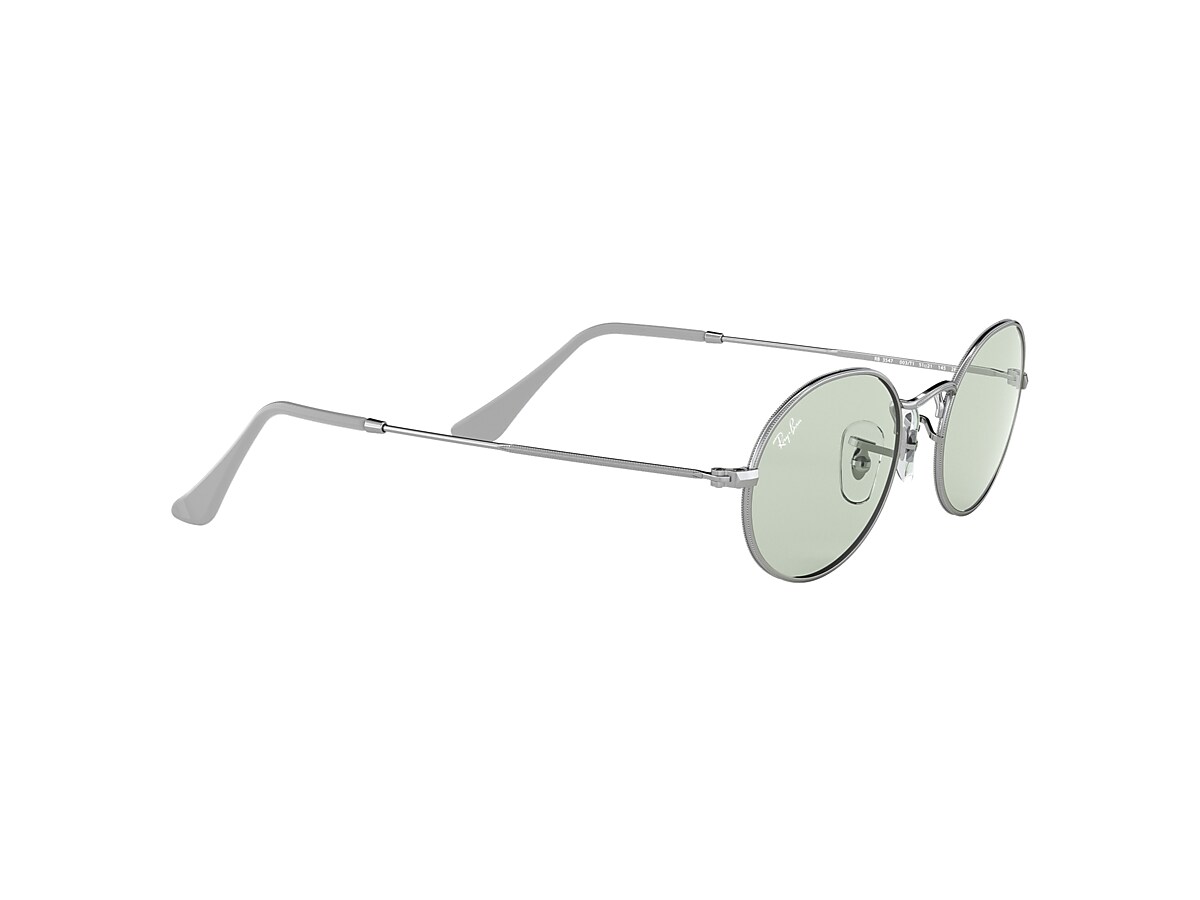 OVAL SOLID EVOLVE Sunglasses in Silver and Green/Blue OVAL SOLID EVOLVE Sunglasses in Silver and Green/Blue