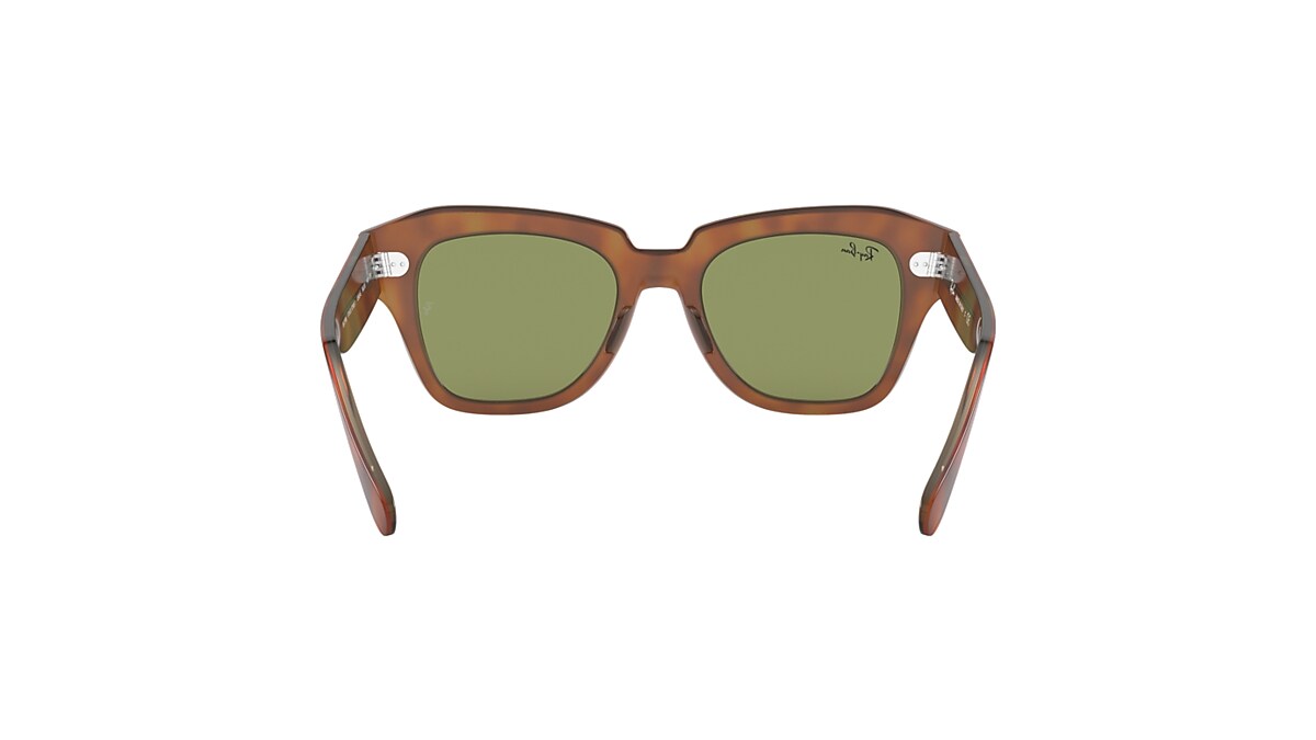 STATE STREET Sonnenbrillen in Havana auf Beige transparent und 