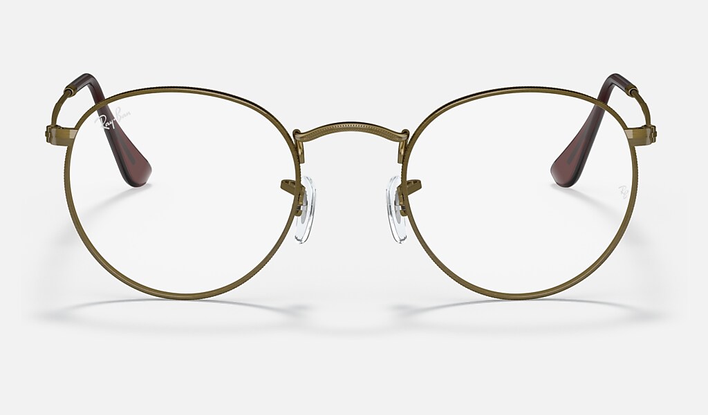 Round Metal Eyeglasses with Antique Gold Frame | Ray-Ban®