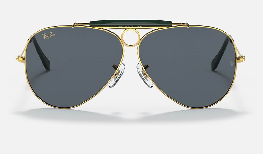 Applicable Laws and regulations Snuggle up Shooter Sunglasses in Gold and Blue | Ray-Ban®