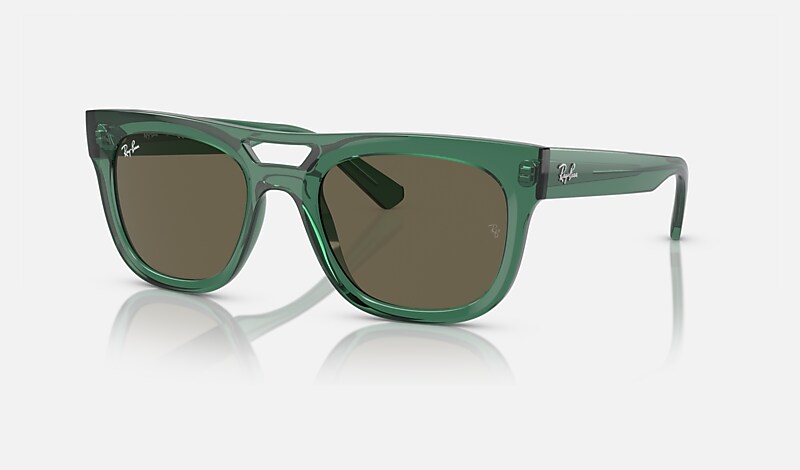 Les lunettes de soleil PHIL BIO BASED en Transparent Vert et Brun